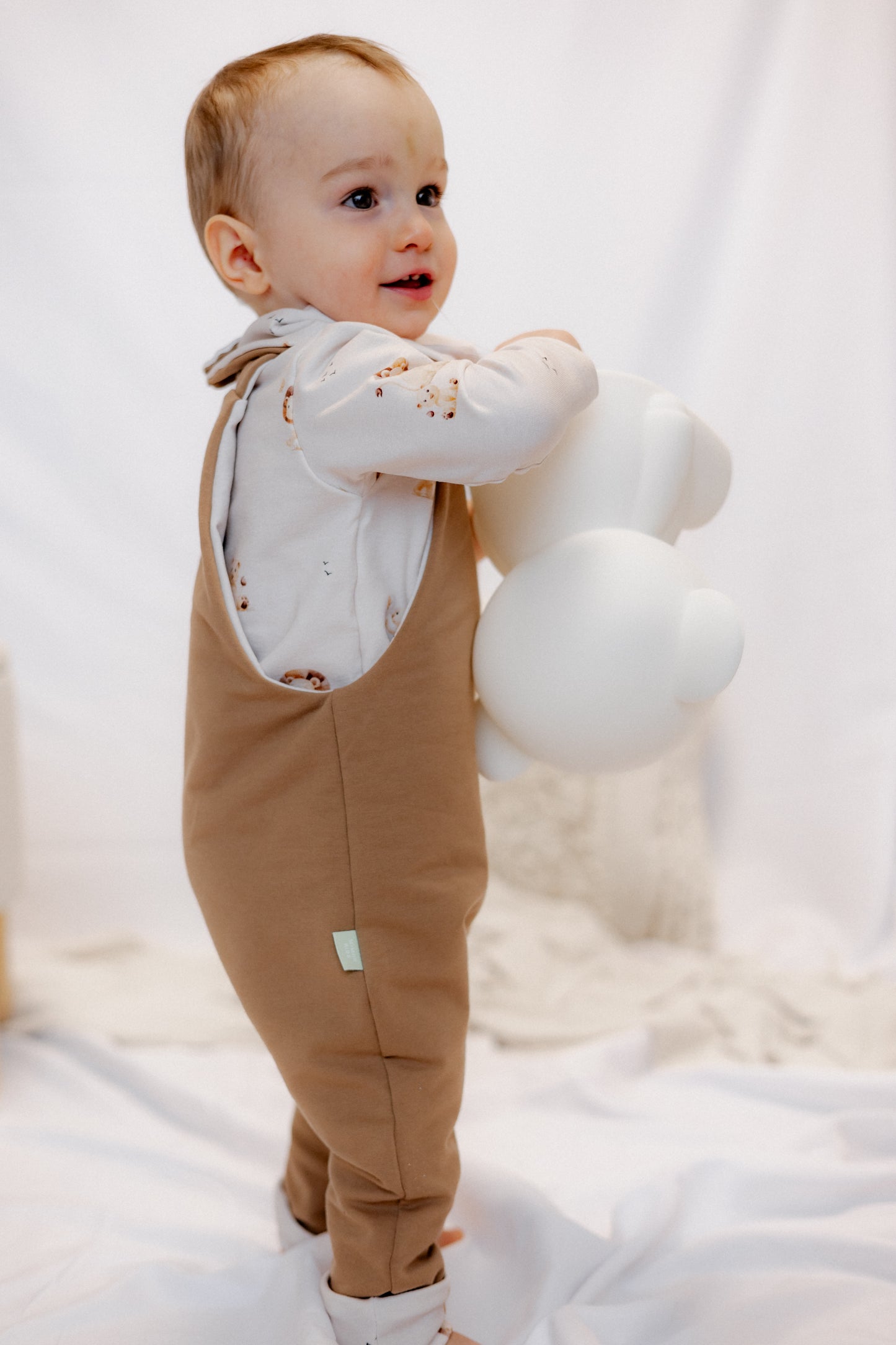 Wendbarer Baby-Latzhose - Löwen