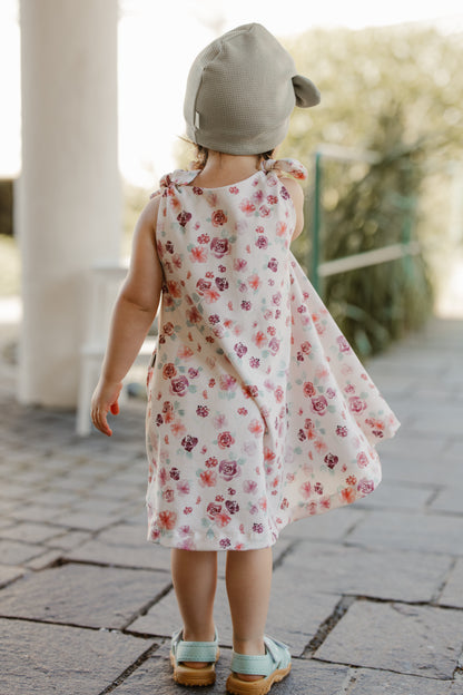 Mädchenkleid mit Schleife und Zipfelsaum, Blumen